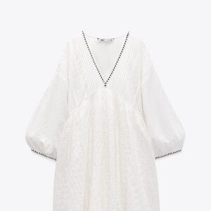 White V-Neck Dress with Black Trim